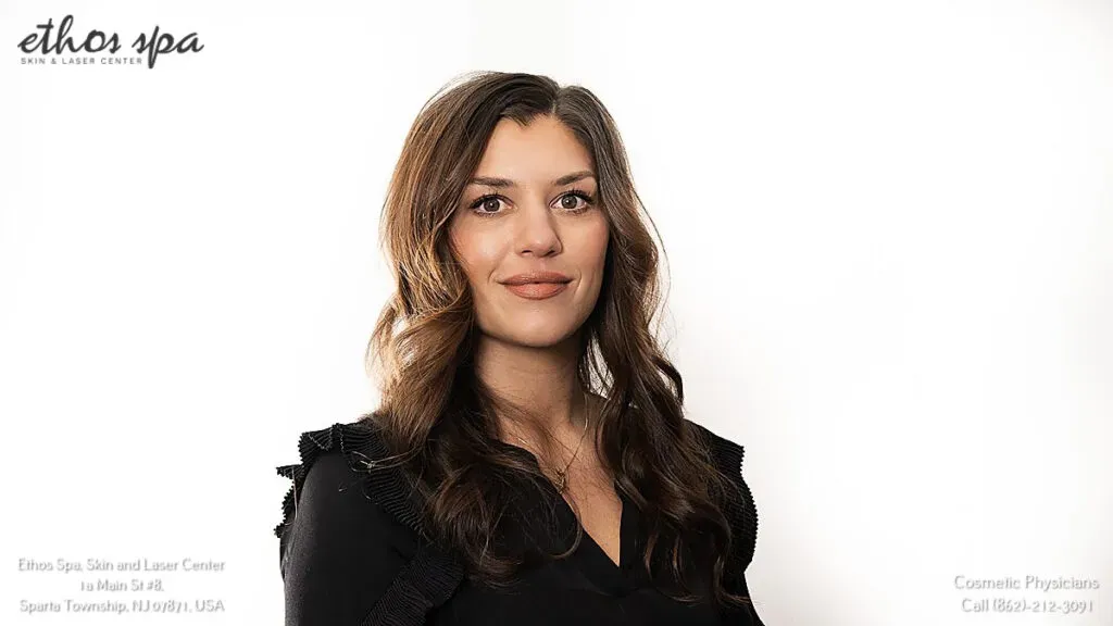 Portrait of a smiling woman with long brown hair