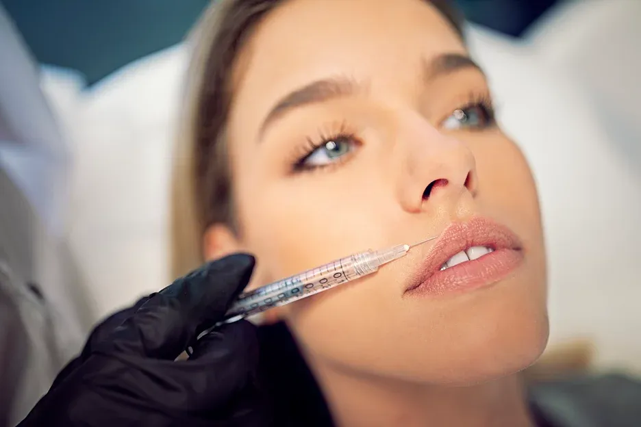 A Woman Getting Lip Filler Treatment